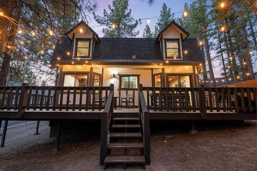 a large house with a staircase leading up to it at Centrally Located Game Room EV 5 Min to Slopes in Big Bear Lake