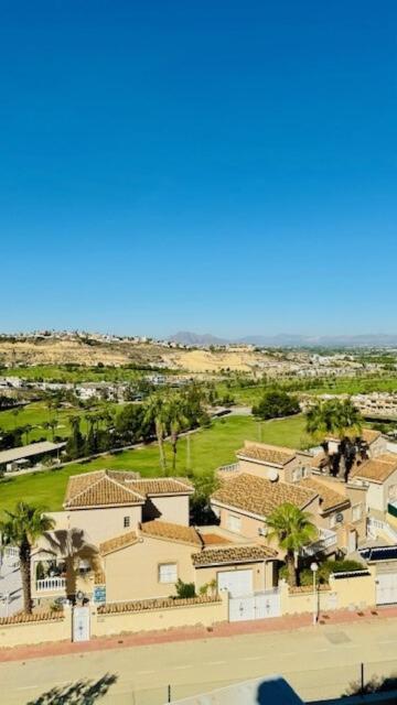 an aerial view of a city with palm trees and houses at Casa Maria with Pool, Terace & Amazing View - near Beach, Golf, Town & Relax - 1-6 Guests in Rojales