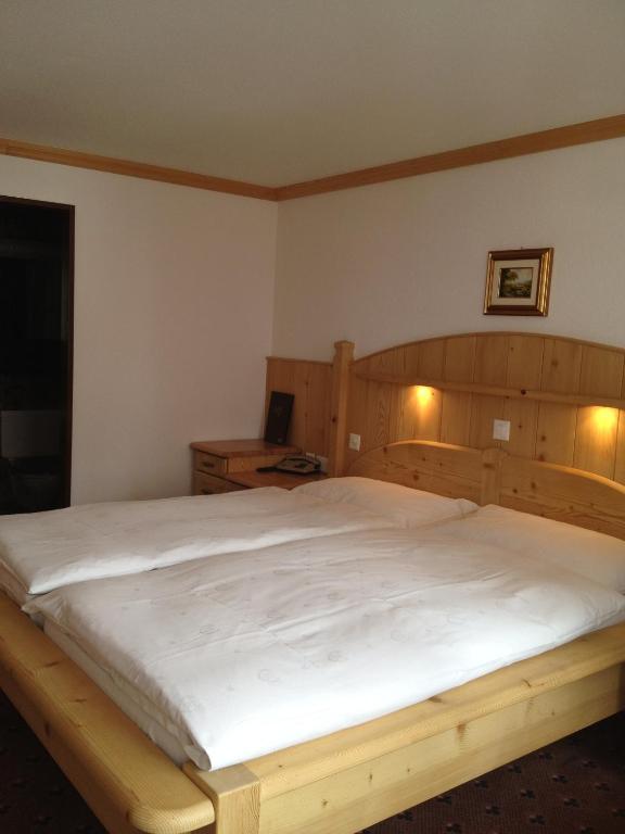 Postel nebo postele na pokoji v ubytování Hotel City