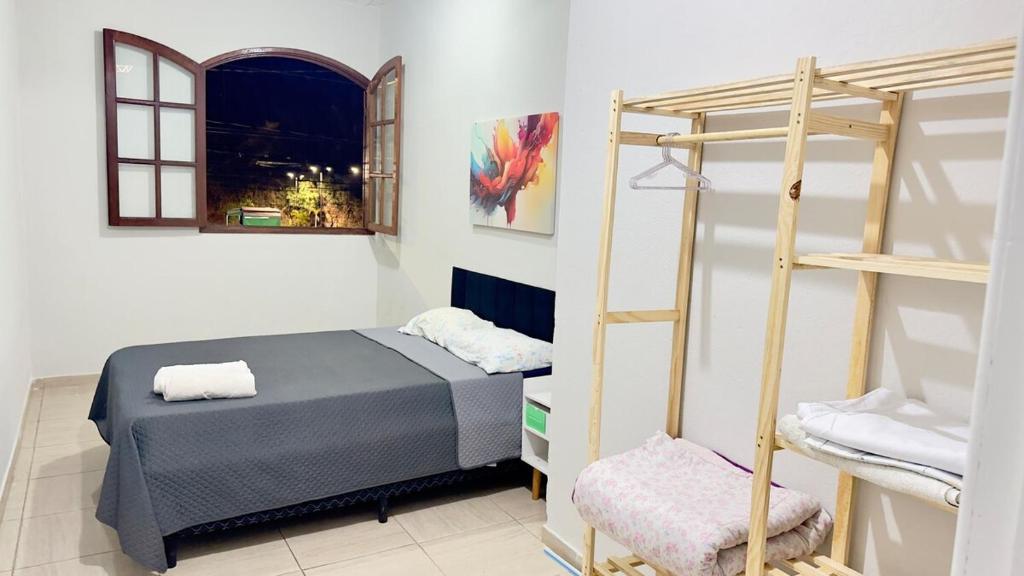 Postel nebo postele na pokoji v ubytování Casa Colonial no Centro