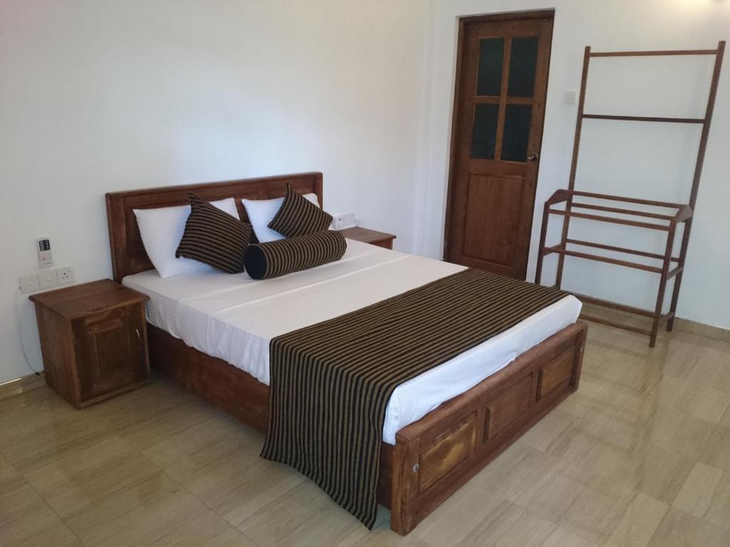 Postel nebo postele na pokoji v ubytování Isanka Lion Lodge