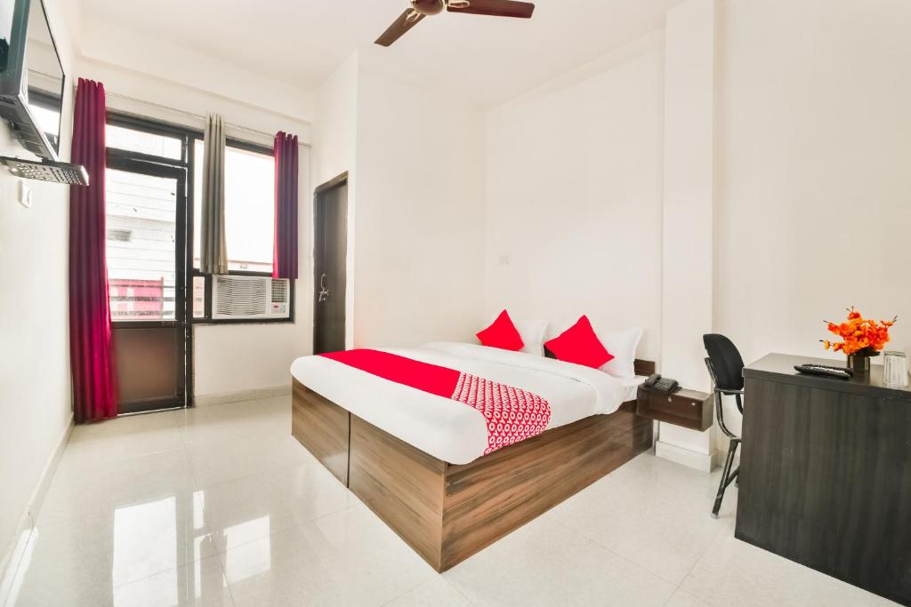 Ένα ή περισσότερα κρεβάτια σε δωμάτιο στο Hotel O Q7