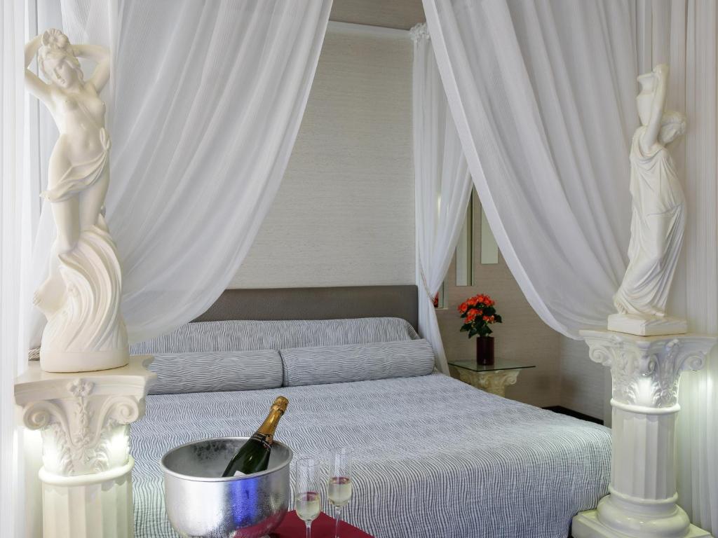 Postel nebo postele na pokoji v ubytování Hotel Motel Prestige