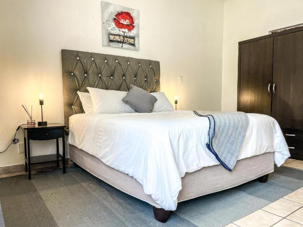 Ένα ή περισσότερα κρεβάτια σε δωμάτιο στο Stars guesthouse