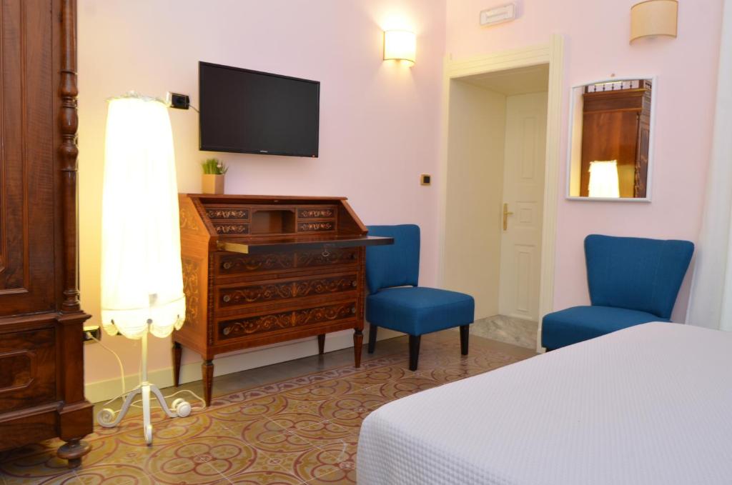 TV a/nebo společenská místnost v ubytování B&B Casa D'alleri
