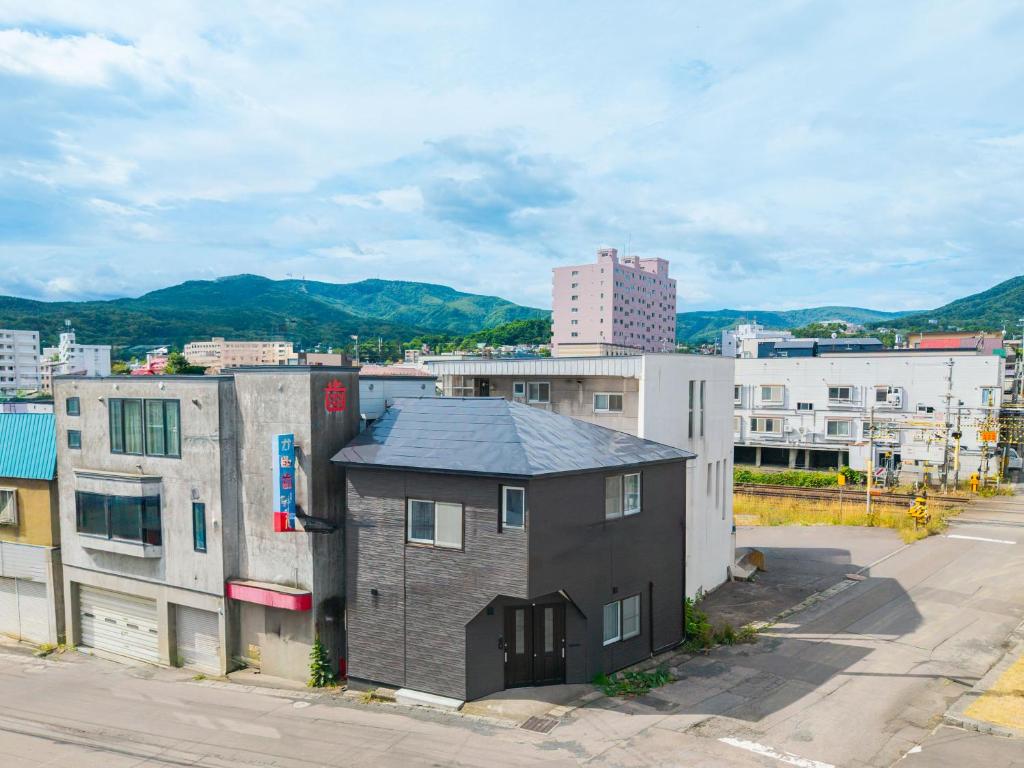 a view of a city with buildings at The Exstra in Otaru