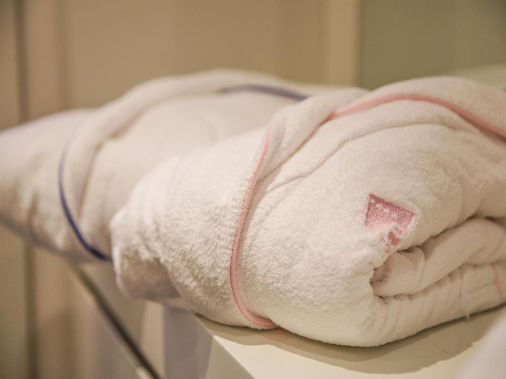 Postel nebo postele na pokoji v ubytování Hotel Motel Prestige