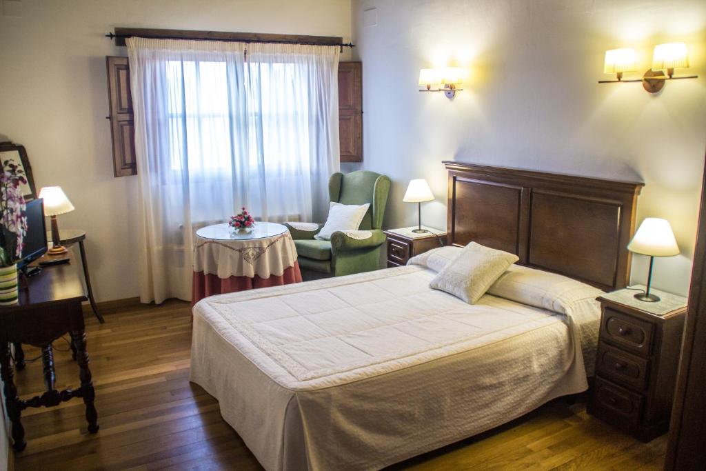 Posteľ alebo postele v izbe v ubytovaní Casa Rural El Regajo Valle del Jerte