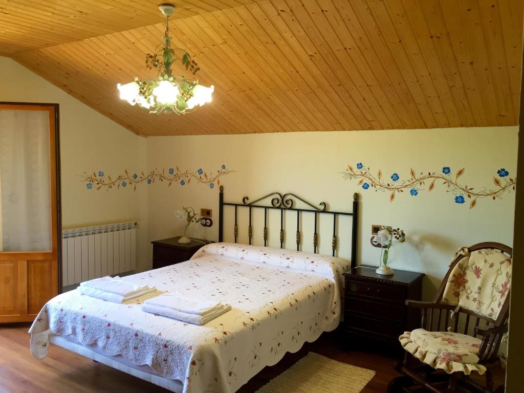 Posteľ alebo postele v izbe v ubytovaní Hotel Rural Casa Ana