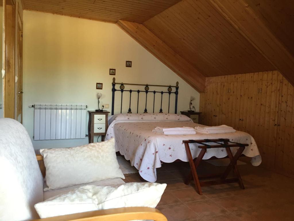 Posteľ alebo postele v izbe v ubytovaní Hotel Rural Casa Ana