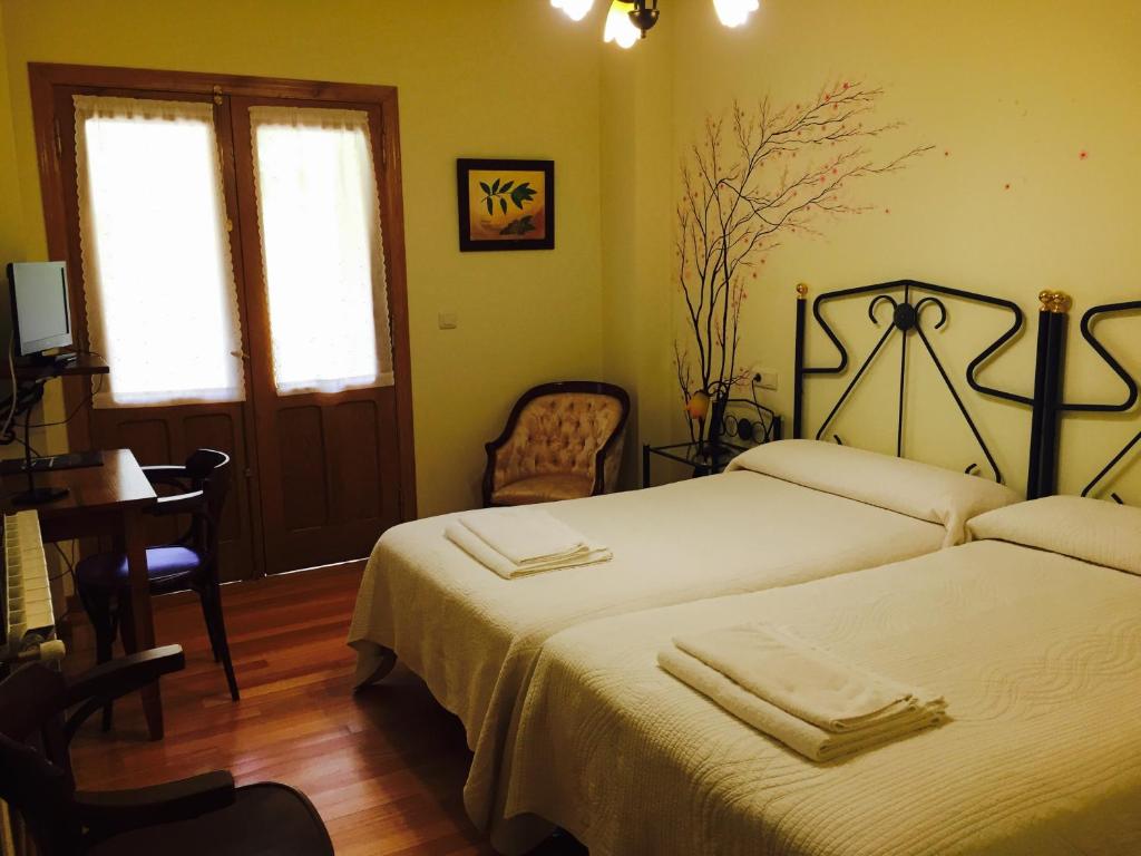 Posteľ alebo postele v izbe v ubytovaní Hotel Rural Casa Ana