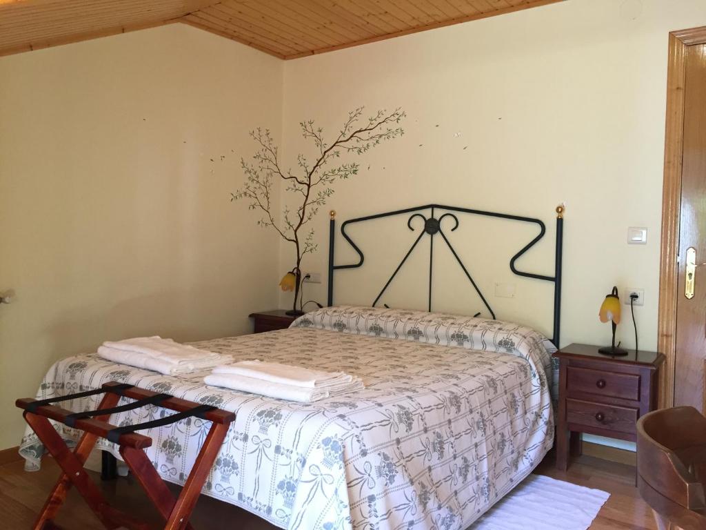 Posteľ alebo postele v izbe v ubytovaní Hotel Rural Casa Ana