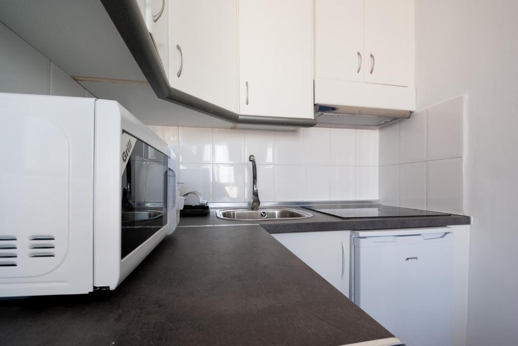 Kuchyň nebo kuchyňský kout v ubytování Apartment Altavista