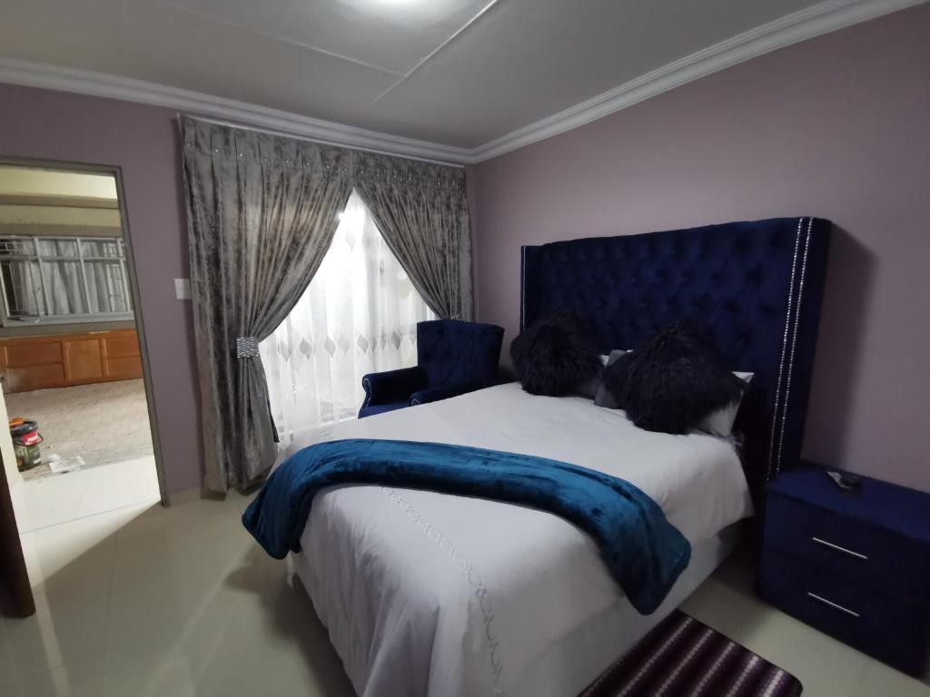 Postel nebo postele na pokoji v ubytování Blackpony Guesthouse