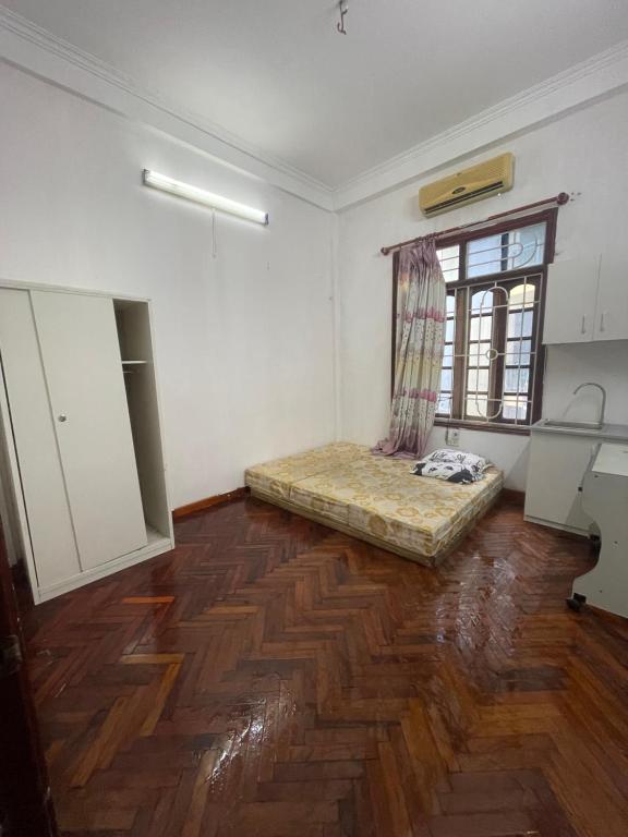 Giường trong phòng chung tại Dung Home - 51 Nghi Tàmm