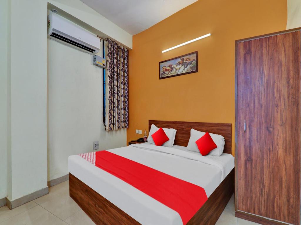 Postel nebo postele na pokoji v ubytování Hotel O SMS