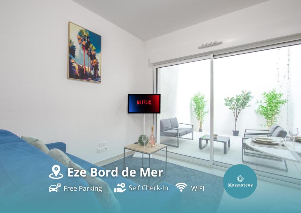 TV a/nebo společenská místnost v ubytování Appartement neuf - Patio intérieur - Parking - EF