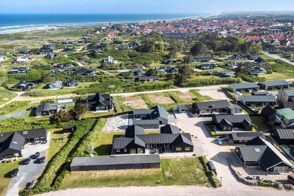an aerial view of a residential neighborhood with houses at LK1886-Lokken-Kallehaven-3 in Løkken