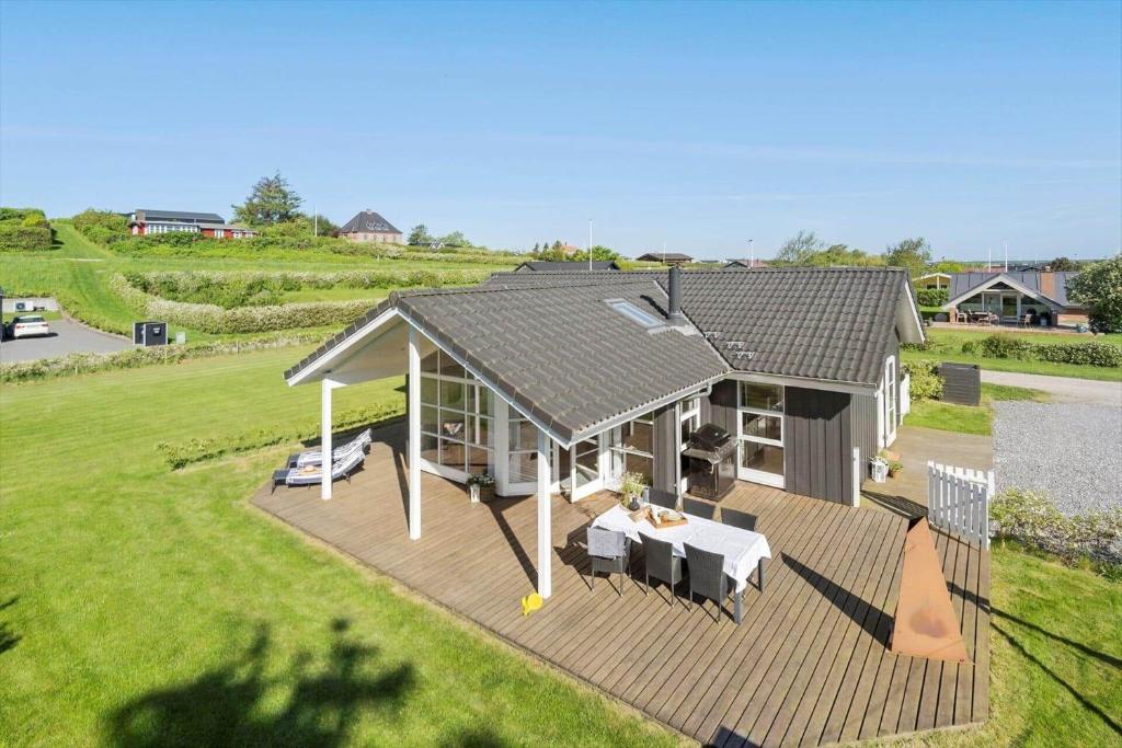 an overhead view of a house with a deck at G139-Lemvig-Porsevej-39 in Lemvig