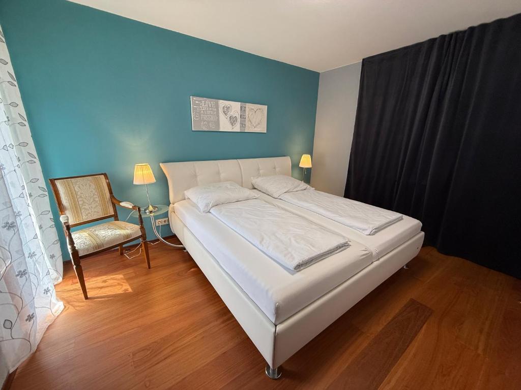 Ένα ή περισσότερα κρεβάτια σε δωμάτιο στο Kilians Lodge