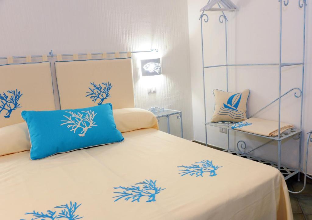 Postel nebo postele na pokoji v ubytování Alghero Sunrise