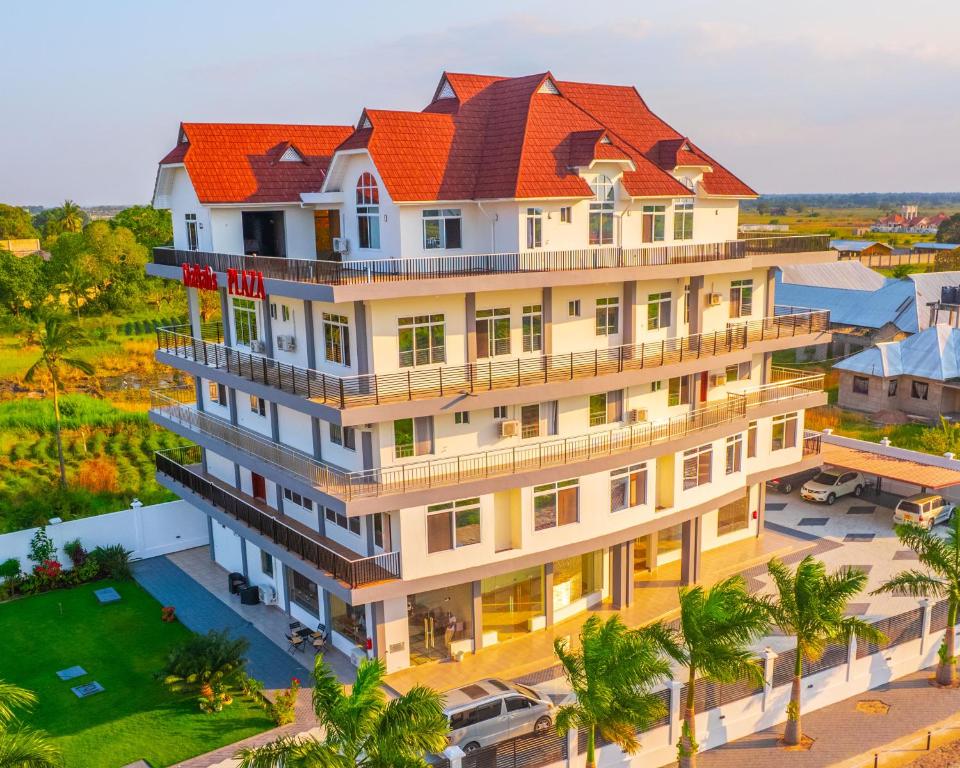 vista sul soffitto di un edificio con tetto arancione di Maftah's Plaza a Bagamoyo