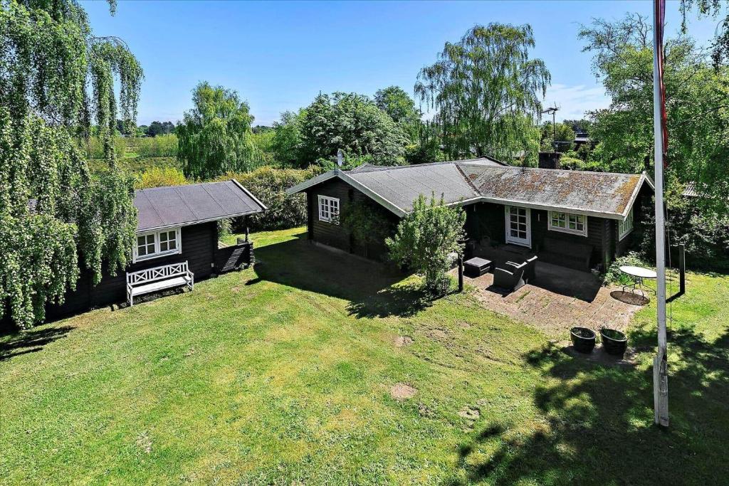 an aerial view of a house with a yard at 1401-N-Liseleje-Korntoften-9 in Liseleje