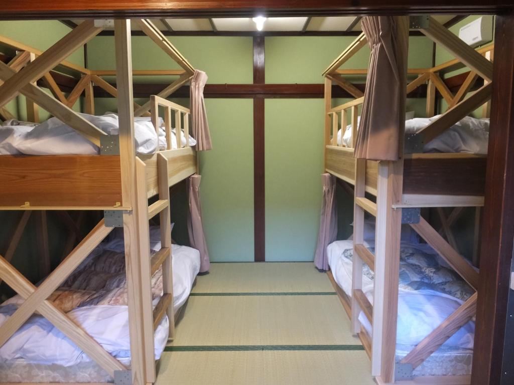 Palanda nebo palandy na pokoji v ubytování Guesthouse Mikkaichi