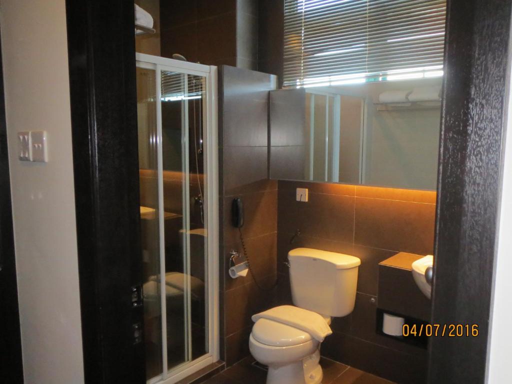 Koupelna v ubytování Tat Place Hotel