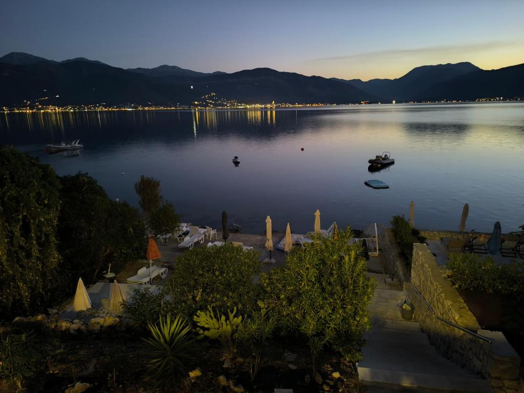 a view of a lake with boats in the water at Apartment Krasici in Krašići