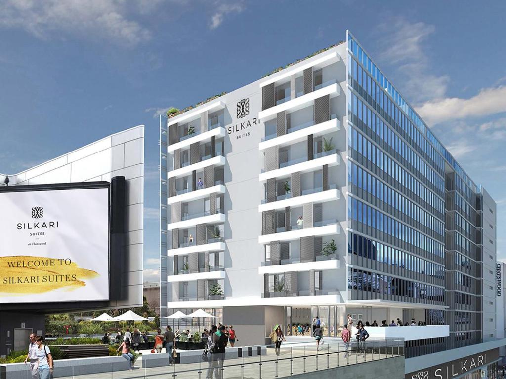 a rendering of a building with people walking in front of it at Silkari Suites at Chatswood in Sydney