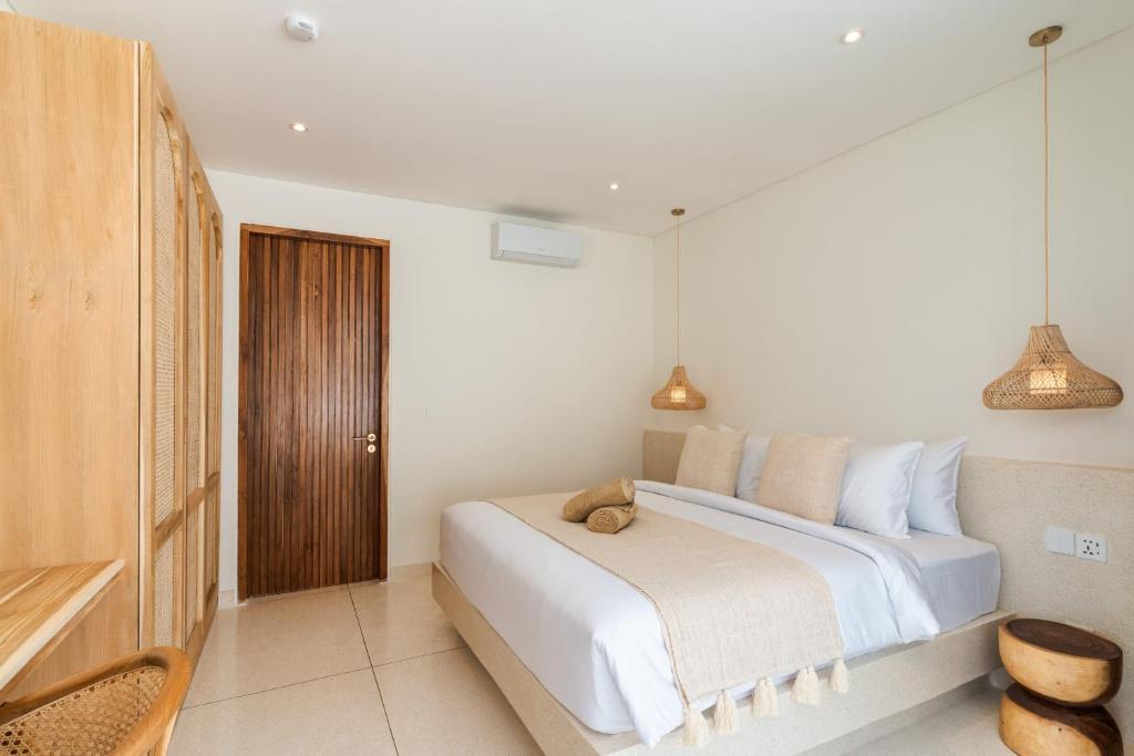 Ένα ή περισσότερα κρεβάτια σε δωμάτιο στο Villa Valli 3, Luxury Mediterranean Villa Bingin