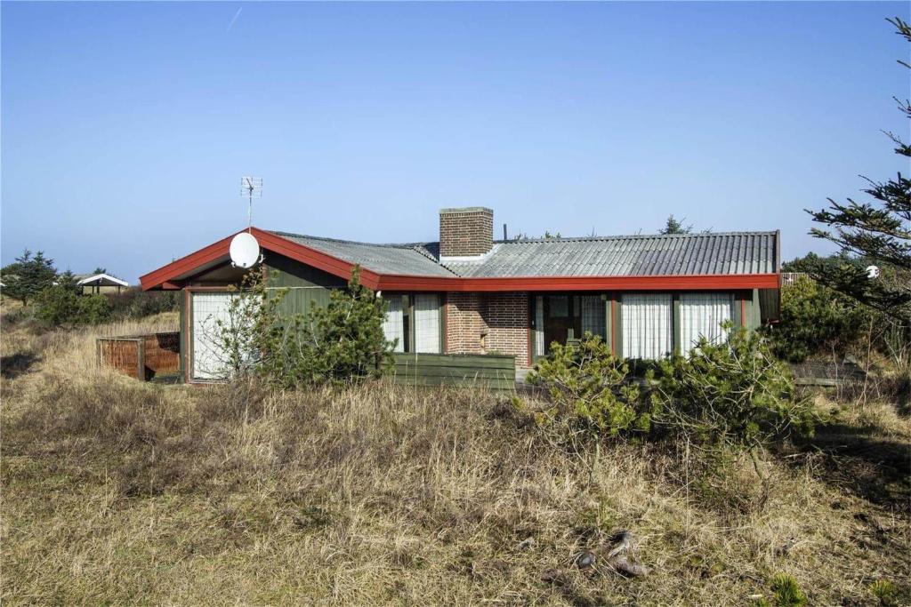 a house sitting on top of a hill at BL363-Saltum-Nyborgvej-4 in Saltum