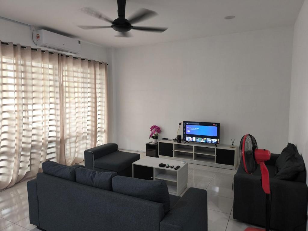 Khu vực ghế ngồi tại De' Jamboree Homestay