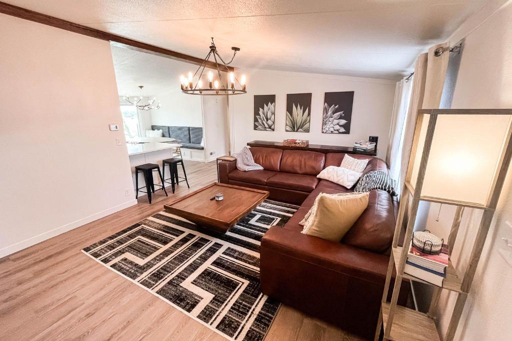 a living room with a couch and a table at The Lookout At Lakewood, By M Host in Bridgeport