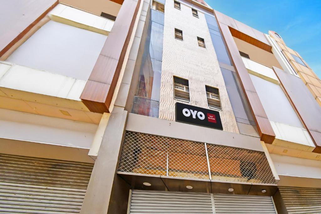 a building with a sign on the side of it at Hotel O Shiv Shakti in Kānpur
