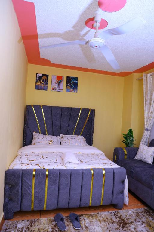 Ένα ή περισσότερα κρεβάτια σε δωμάτιο στο Deluxe Homes, Voi