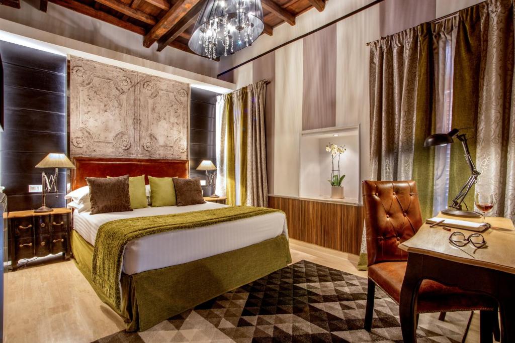 Postel nebo postele na pokoji v ubytování The Inn at the Roman Forum Luxury Collection - The Inn At The Roman Forum