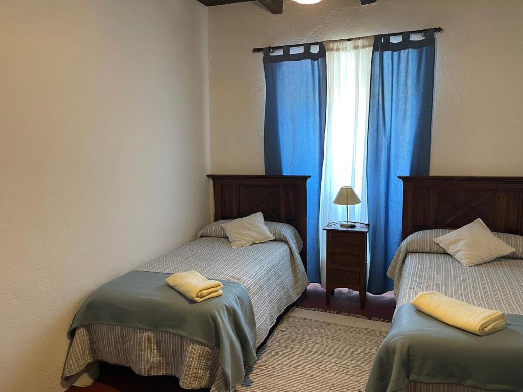 Postel nebo postele na pokoji v ubytování Casa Deocano