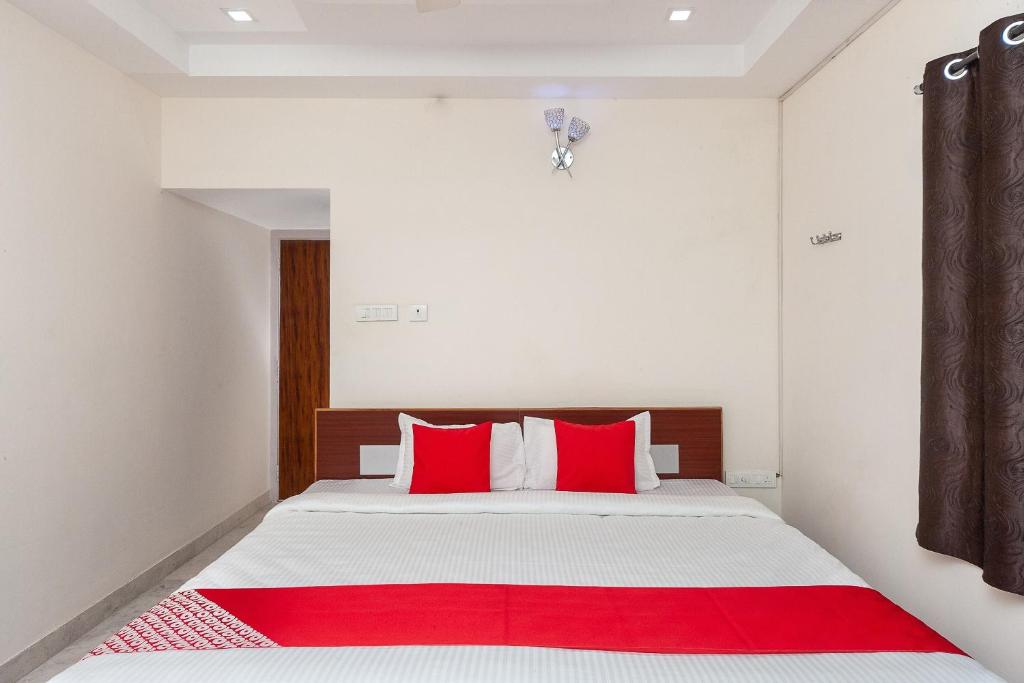 Ένα ή περισσότερα κρεβάτια σε δωμάτιο στο Super Hotel O Le Mint OMR