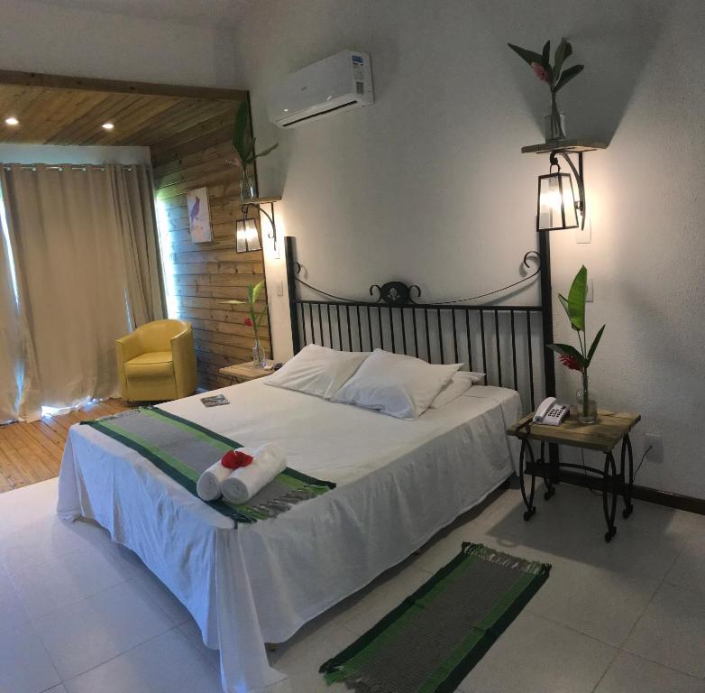 Postel nebo postele na pokoji v ubytování Cabana Eco Resort