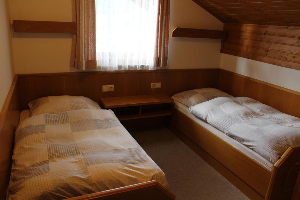 Postel nebo postele na pokoji v ubytování Landhaus Stocker