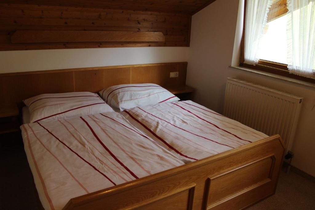 Postel nebo postele na pokoji v ubytování Landhaus Stocker