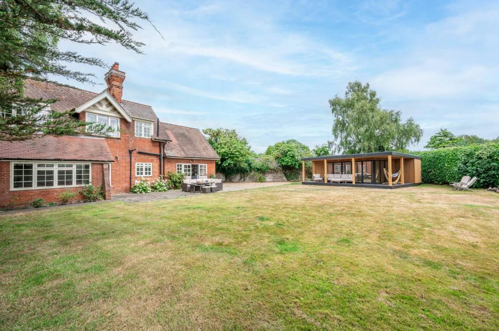 an image of a house with a large yard at Tower Cottage, Walberswick in Walberswick