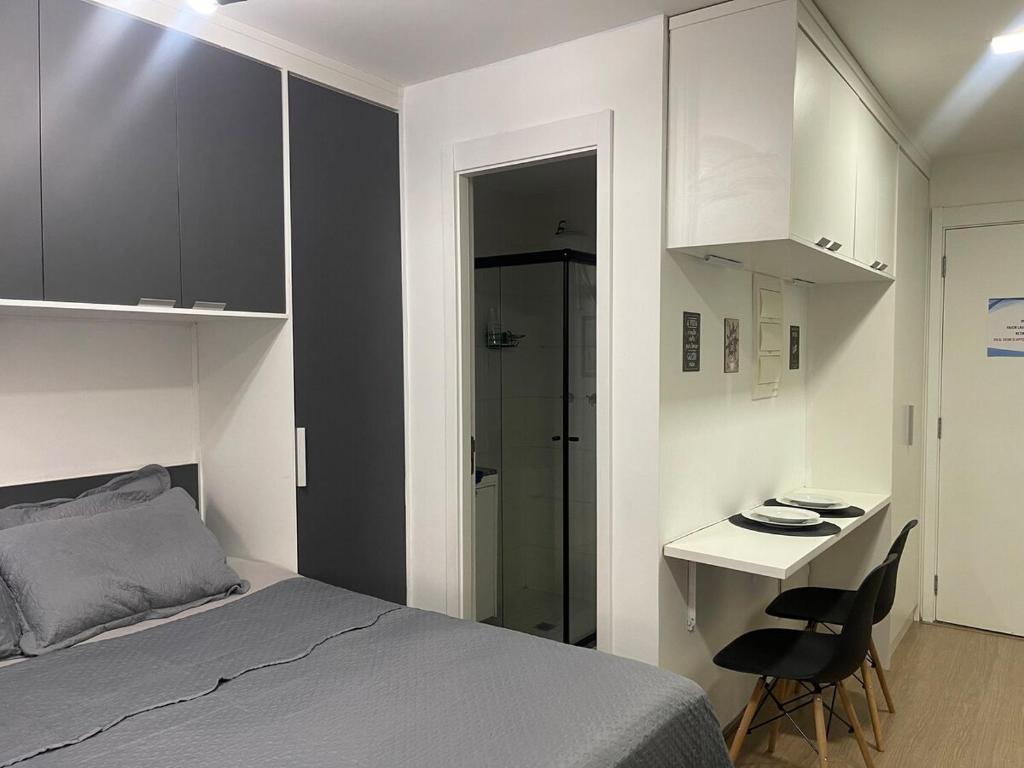 Postel nebo postele na pokoji v ubytování Studio Novo Brás