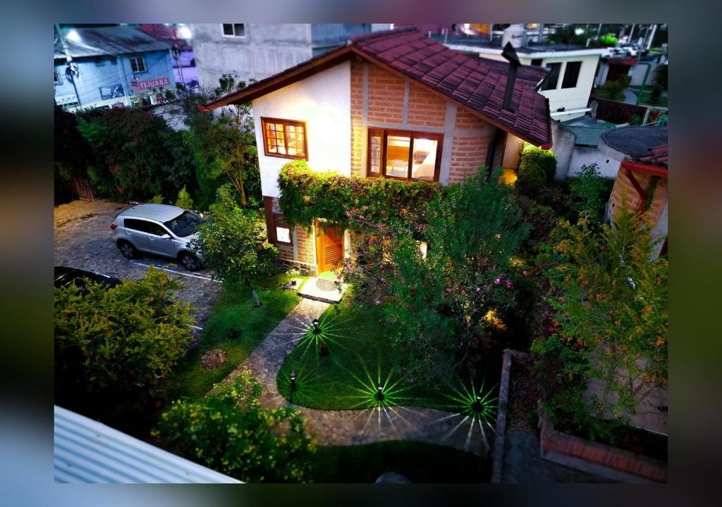 a car parked in front of a house at Love Nest Atitlán in Panajachel