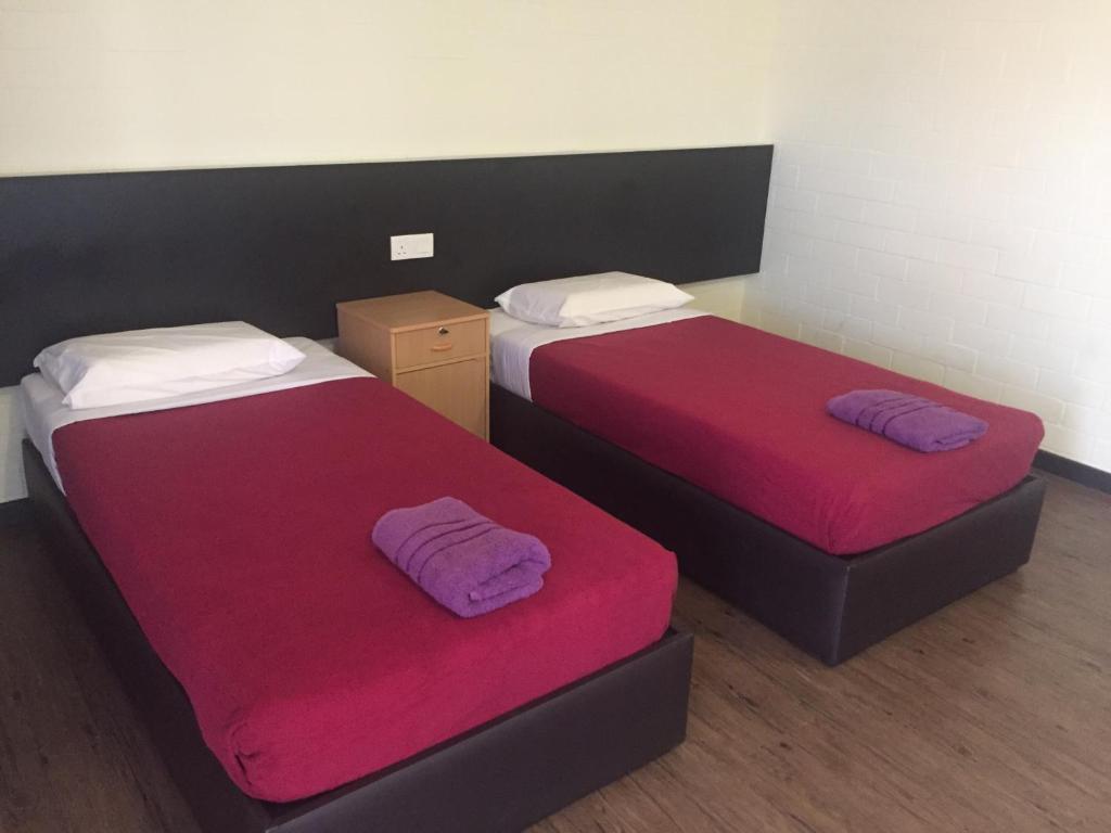 Postel nebo postele na pokoji v ubytování Sayy Haa Inn