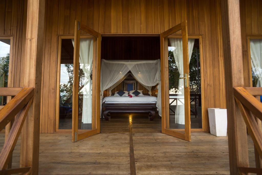 Postel nebo postele na pokoji v ubytování Siladen Resort & Spa