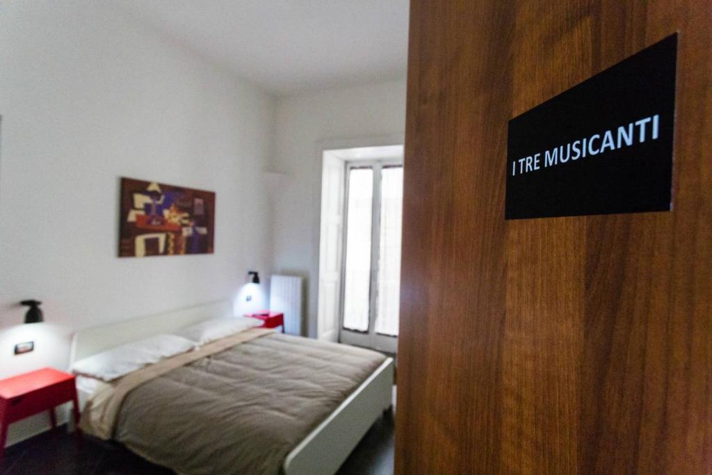 Posteľ alebo postele v izbe v ubytovaní Casa Retro'