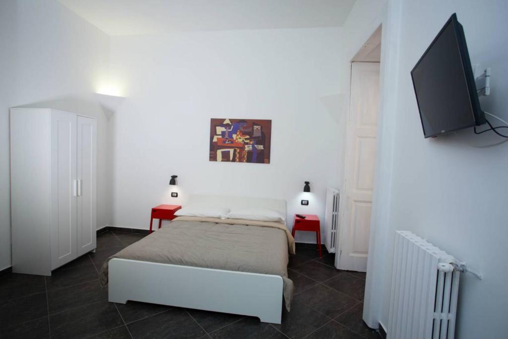 Posteľ alebo postele v izbe v ubytovaní Casa Retro'